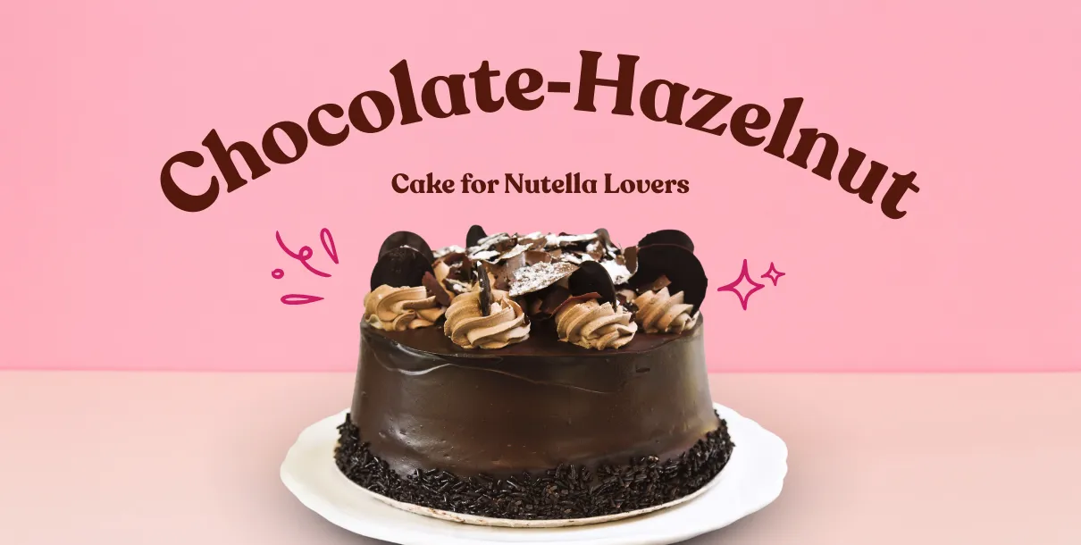 Chocolate‑Hazelnut Layer Cake Covered In Glossy Frosting, Topped With Chopped Hazelnuts And A Nutella‑Style Swirl.
