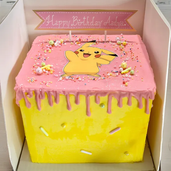Yellow Drip Cake with Winnie the Pooh Topper